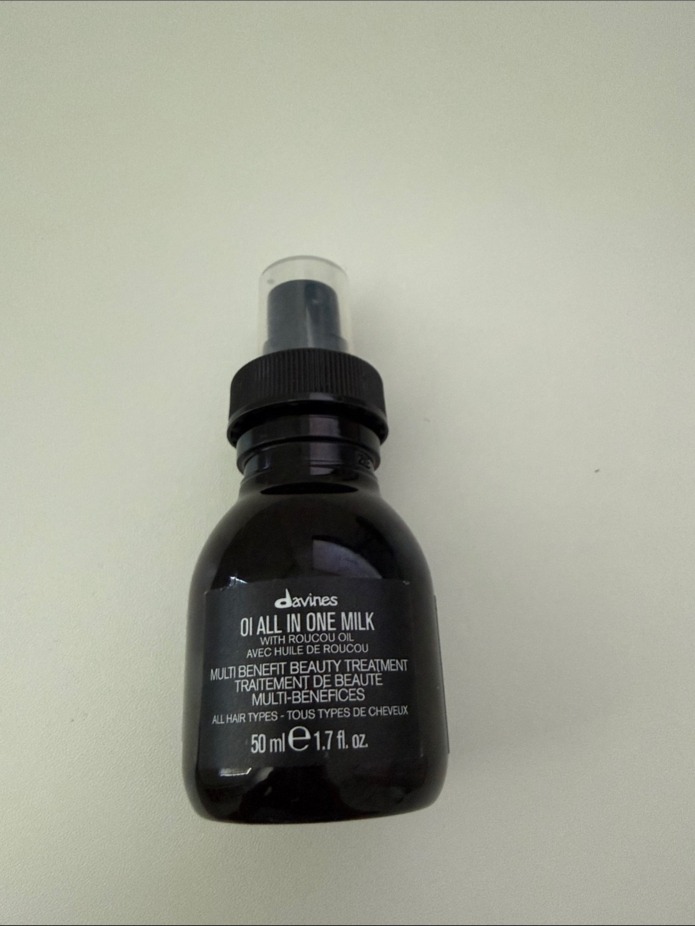full bottle of Davines  all in one milk leave in conditioner